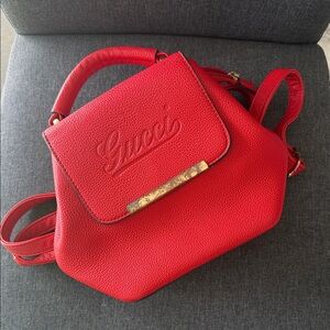 Red Leather Embossed Logo Backpack with Gold Accent